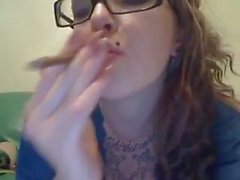 webcam slut smoking blunt and fucking her own ass