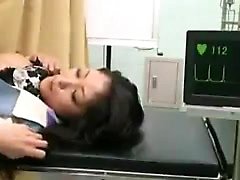 Dazzling Asian girl has a horny doctor fingering and fuckin