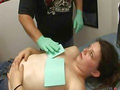 This slut is getting pierced