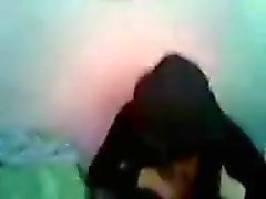 Arab chick at table flashes her tits