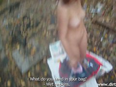 Petite amateur babe loses her clothes and gives a nice blowjob outside