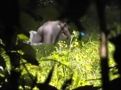 voyeuring couple in public park in Amsterdam