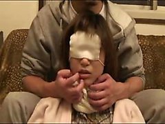 Asian chick is wearing a mask and he tears it open for a bl