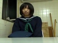 Japanese teen in schoolgirl uniform stripped