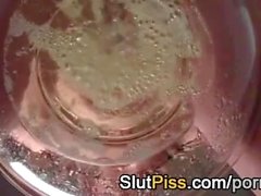 Girl drinks piss in strict fetish play
