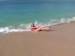 Amateur slut pussy fingering on the beach