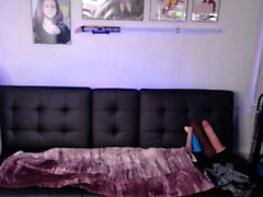 Amateur young brunette enjoys dildo on solo masturbation