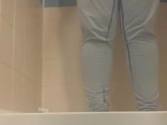 S pissing herself in the shower