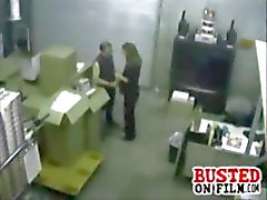 Horny coworkers get busted on security cam doing a blowjob in the warehouse office