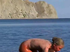 Perfect Teens Likes Body Paint In Nude Beach Voyeur