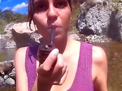 Beautiful girl smoking her pipe