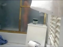 My sexy niece takes a shower in our bathroom