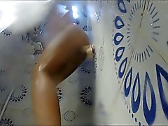 Amazing milf uses the wall dildo on the shower