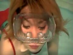 Asian Girl Underwater Breath Hold